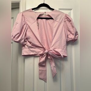 Express open back, tie blouse